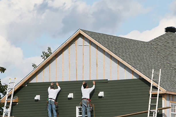 Professional Emergency Siding Repair technician working in Spring Grove, IL